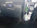 an image of a dirty kitchen with a lot of clutter on the floor