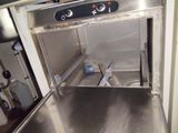a stainless steel oven with a door open in a kitchen