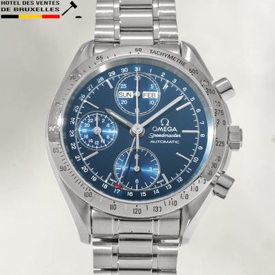 an image of a close up of a watch on a white surface
