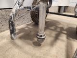 a close up of a bike with a chain attached to it