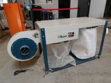 a machine that is sitting on the floor in a room