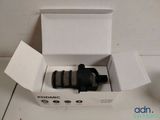 a box with a camera inside of it on the floor