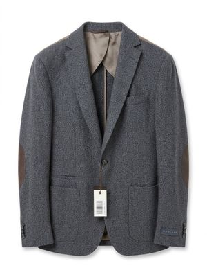 a picture of a gray jacket with a tag on it