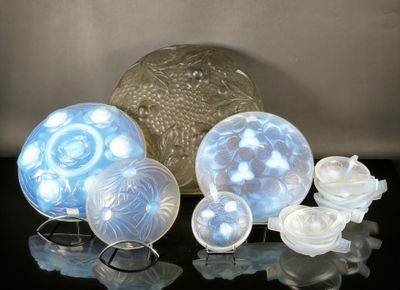 a lot of glass objects sitting on a table