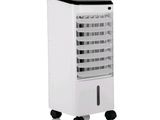 a white and black air cooler sitting on top of a white table