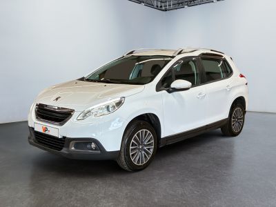 the white car is parked in a large room with a gray floor
