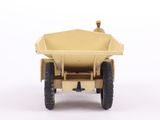 a toy truck that is sitting on a white surface