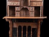an old wooden desk with drawers and drawers on top of it