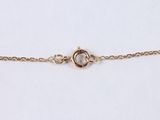 a close up of a gold chain bracelet with a clasp