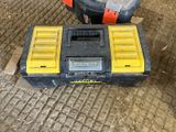 yellow and black tool box sitting on the ground next to a black and yellow tool box