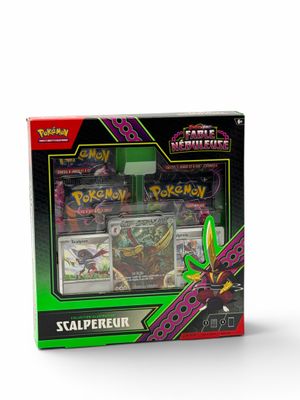 a box of pokemon cards sitting on top of a white surface