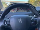the steering wheel and dashboard of a car with a steering wheel