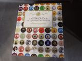 a book that has a bunch of different colored buttons on it