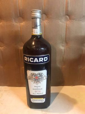 a bottle of wine that is sitting on a table