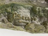a close up of a bronze statue of a man and a dog