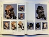 a book with pictures of helmets and helmets on it