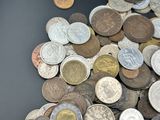 a pile of coins sitting on top of a table