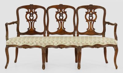 an image of a set of three wooden chairs with upholstered seats