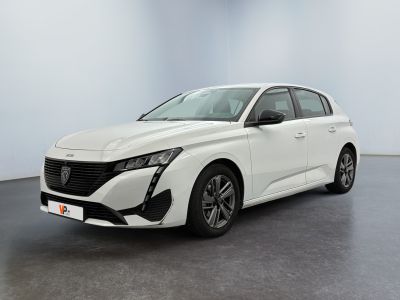 a white car is parked in a white room with a black floor