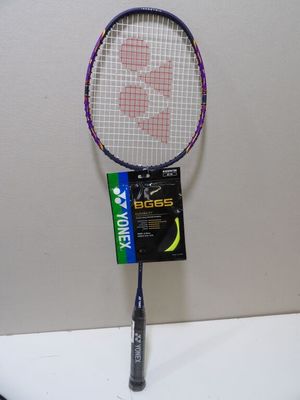 a tennis racquet that is on a table