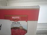 a box of food sitting on a shelf in a refrigerator