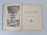 an open book with a picture of a hot air balloon in the air