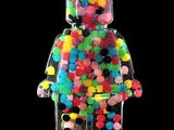 un bonhomme Lego fait de bonbons Jelly Beans sur fond noir