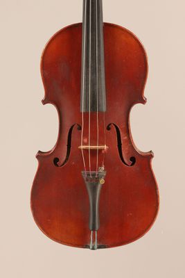 an old violin with a bow on a white background