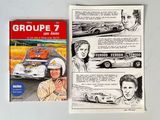 two books on a table with a drawing of a race car and a drawing of a man