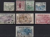 several different types of stamps are on a black surface