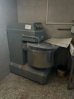 an image of a kitchen with a mixer in the corner