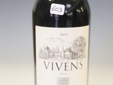 a bottle of wine that is sitting on a table