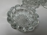 a glass bowl that is sitting on a table