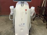 a white machine that has a solar panel on top of it