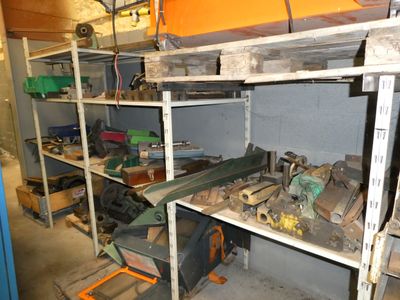 a room filled with lots of tools on shelves