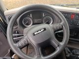 dashboard of a truck with a steering wheel and dashboard controls
