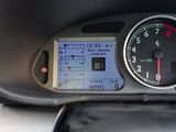 a close up of a car dashboard with a speedometer