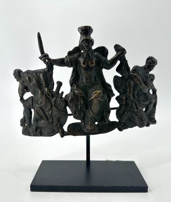 bronze statue of a man on a horse with a group of people around him