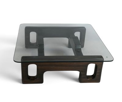 an image of a glass coffee table with a wooden base