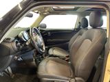 the interior of a car with a steering wheel and a dashboard