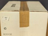 a box that is sitting on top of a wooden table