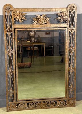 a mirror that is sitting on the floor in a room