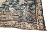 a close up of a rug on a white background with trees