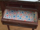 a drawer that has a pattern on the top of it
