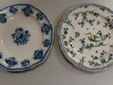 two plates with blue and white designs on them