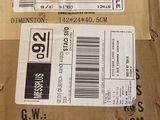 two packages of food sitting on top of a cardboard box