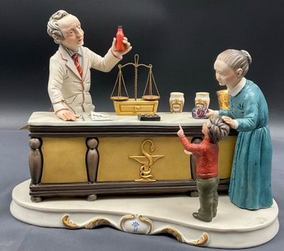 a figurine of a man and a woman at a bar