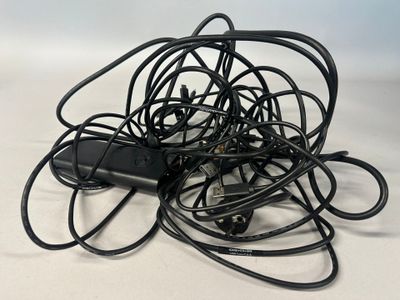 a pile of wires that are tangled up on a table