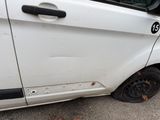 a white van parked on the side of the road