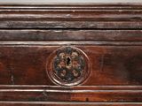 an old wooden chest with a lock on the top of it